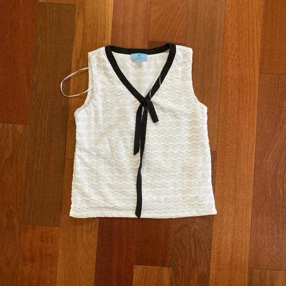 eyelet top with black ties